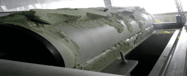 Vacuum filter for sludge dewatering